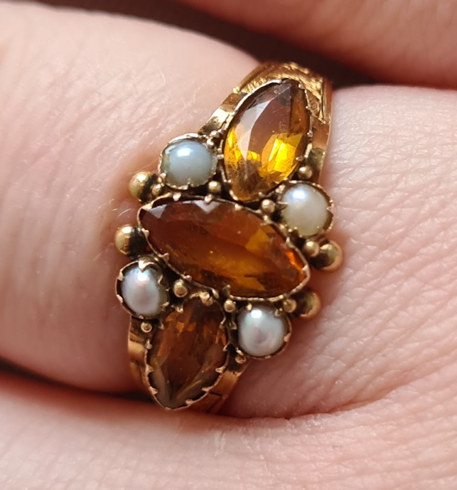 Ring with glued-on pearl